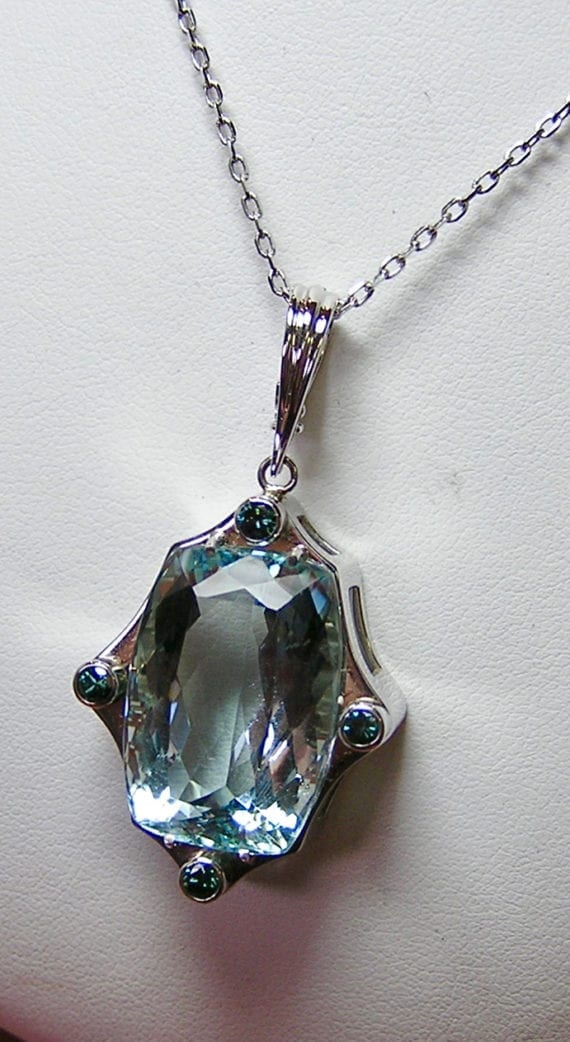 Aquamarine Gemstone Pendant with Blue Diamonds